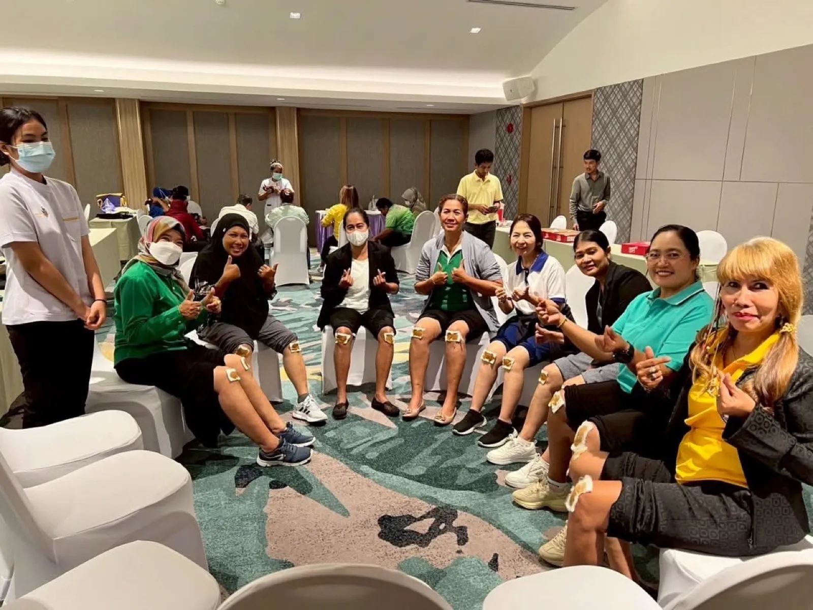 Participants after a herbal knee poultice session